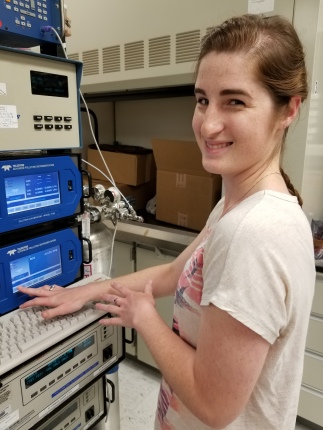 DAQ scientist Rebecca Graves works with several analyzers in the Division's lab.